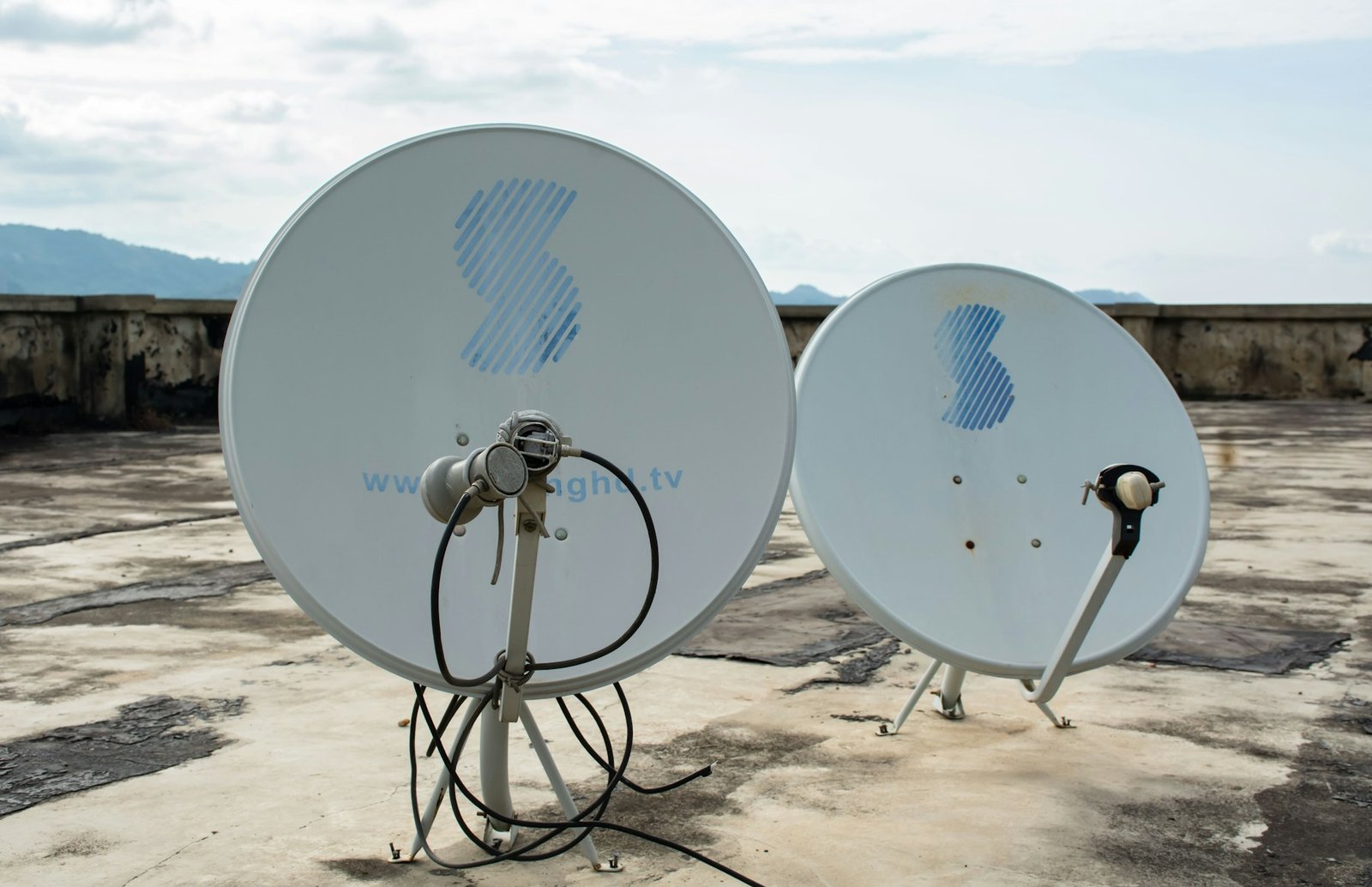 Direct-to-home satellite dishes installed on a rooftop